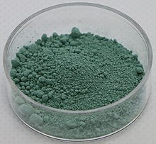 https://upload.wikimedia.org/wikipedia/commons/thumb/7/7f/Uranium_tetrafluoride.jpg/220px-Uranium_tetrafluoride.jpg