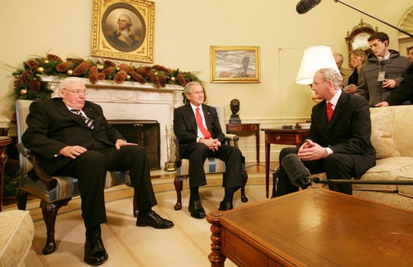 United States President George W. Bush meeting with Ian Paisley and McGuinness in the Oval Office in December 2007.