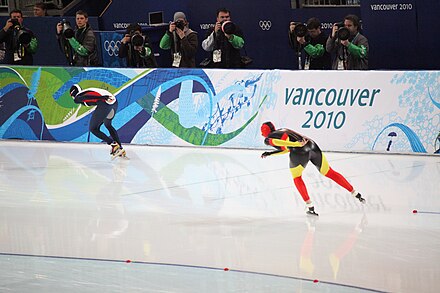 Martina Sablikova (CZE - out) and Daniela Anschutz-Thoms (GER - in) in the final 8th pair of the 5000m race. Women's 5000m Speed Skating Pair 8.jpg