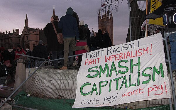 "Smash Capitalism" - Student protests - Parliament Square, London 2010.jpg