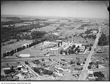 Aerial view of the Kodak campus in Mount Dennis in 1917, which is now a TTC Black Creek Servicing Yard and LRT station in 2022 called Mount Dennis Station. The homes at the bottom left are now the site of a No Frills Supermarket, which were ex-propriated due to the CN rail-line expansion through the area Aerial view of the Kodak campus in Mount Dennis.jpg