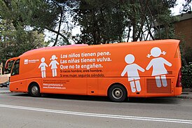 Bus with transphobic message promoted by the right-wing organization HazteOir.org. Top text translates to "Boys have a penis. Girls have a vulva. Don't let them deceive you. If you're born a man, you are a man. If you're a woman, you'll keep being one." in Spanish. Autobus transfobo de HazteOir 06.jpg