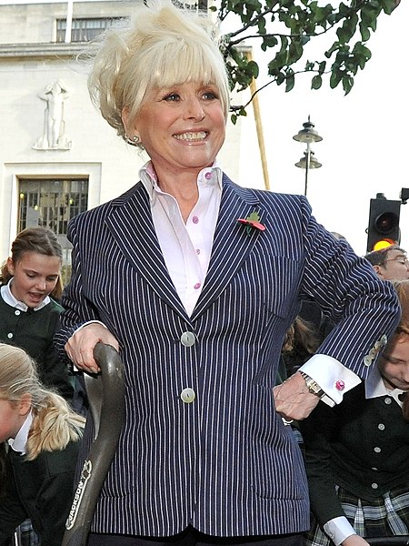 Grant and Phil's mother, Peggy Mitchell as played by Barbara Windsor (pictured), was featured prominently in Sharon's return storyline in May 2001, wh