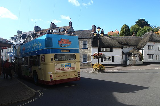 A classic open-top bus in Beer village, Devon.