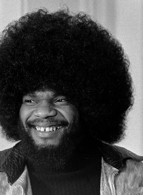 Black and white photo of grinning Billy Preston