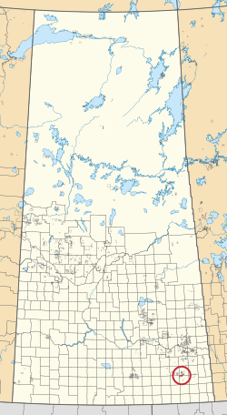 A map of the province of Saskatchewan showing 297 rural municipalities and hundreds of small Indian reserves. One is highlighted with a red circle.