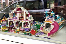 Children's toys displayed in a window in Ultrecht (2017) Children's Toys Lego brand Mansion Boat in Window Utrecht NL 2017.jpg