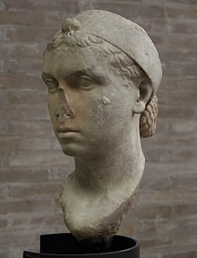 A bust of Cleopatra VII dated to 40-30 BC, now located at the Vatican Museums, showing her with a "melon" hairstyle and a Hellenistic royal diadem Cleopatra VII, Marble, 40-30 BC, Vatican Museums 002.jpg
