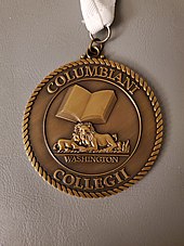 Commencement Medal worn by graduates of the Columbian College of Arts and Sciences at The George Washington University. Columbian College of Arts and Sciences Graduation medal.jpg