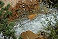 Creek eroding through hydrothermally-altered rocks (Sulphur Works, Lassen Volcano National Park, California, USA) 1 (23936200548).jpg