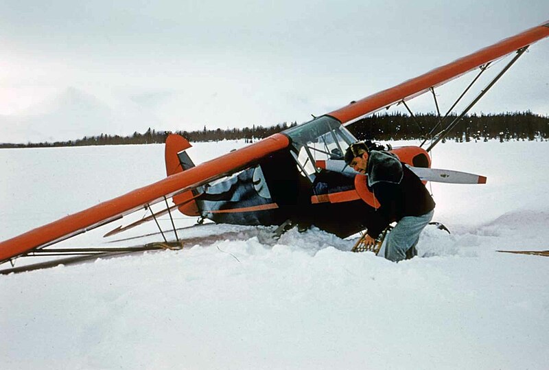 File:Digging an airplane out of the snow.jpg