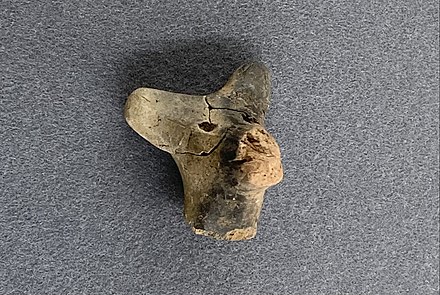 A fragment of a Jōmon period dogū with pointed ears, unearthed in Aomori Prefecture.