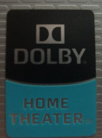 A Dolby home theater badge on a laptop computer