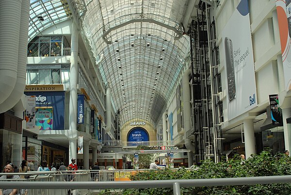 The interior of the Toronto Eaton Centre in Toronto, Ontario, Canada, a 201,320-square-metre (2,167,000 sq ft) super-regional shopping mall