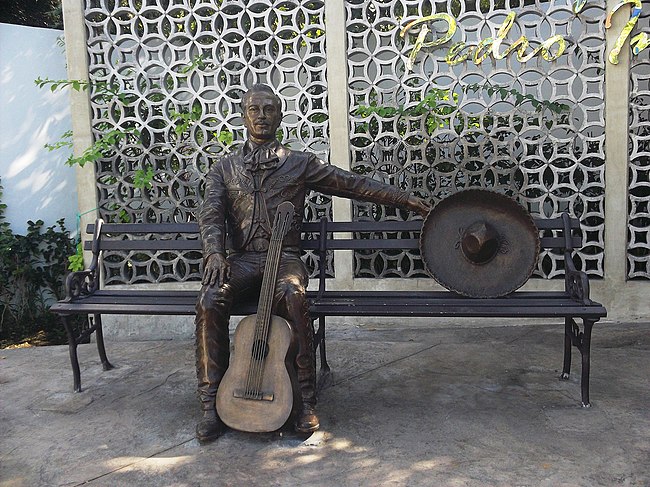 A statue in Mérida, Yucatán, of Pedro Infante who, with Jorge Negrete and Javier Solís are known and made up the "Three Mexican Roosters" of Mexican music.