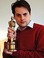 Actor Frazor Brown holding an Academy Award