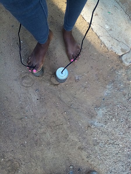 File:Girl trying out the Dikakaba at Ginger backyard in Gaborone.jpg