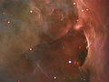 Hubble detail of a region west of the Trapezium, showing arcs and bubbles formed when stellar winds collide with existing interstellar material