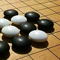 27 May: AI beats the human world champion at the game Go. Go board part.jpg