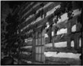 Historic American Buildings Survey Douglas McCleery, Photographer June 1958 INTERIOR VIEW- (CABIN IS IN ENCLOSURE) NORTH WALL - Samuel Adair Cabin, John Brown Memorial Park (moved HABS KANS,61-OSA,1-1.tif