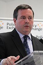 Kenney in 2014 Hon Jason Kenney MP speaking at the awarding of the inaugural Disraeli Prize (14436915812).jpg