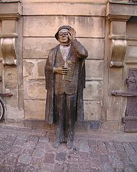 Statue of Evert Taube at Järntorget in Stockholm (1985).