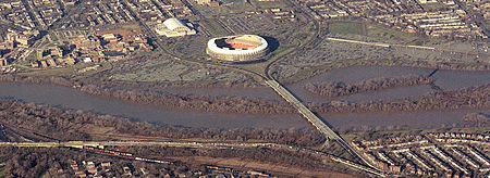 Whitney Young Memorial Bridge (center of image) leading from RFK Stadium across Lake Kingman and Kingman Island to the eastern shore of the Anacostia River, pictured in 1991 Kingman Lake - 1991.jpg