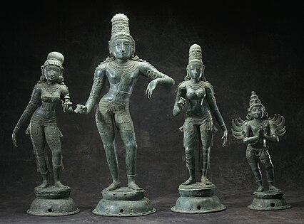 Krishna with his consorts Rukmini and Satyabhama and his mount Garuda, Tamil Nadu, India, late 12th–13th century[96]
