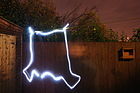 T-shirt drawn with LED on long exposure photograph