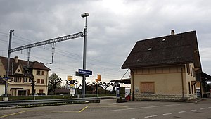 Three-story building with gabled roof