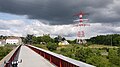 * Nomination Footbridge and high voltage power lines near Paris. --Pline 09:58, 16 May 2011 (UTC) * Decline Bike in foreground, lack of sharpness except for the powerlines, significant distortions --Saffron Blaze 15:15, 18 May 2011 (UTC)