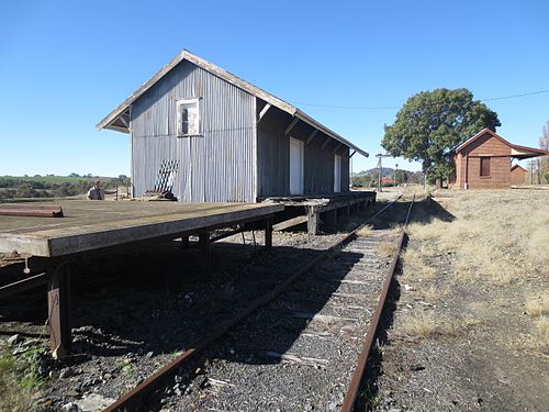 loading platform and old warehouse both derelict at Galong Railway Station, Australia