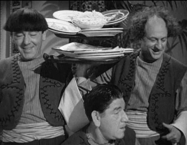Moe Howard, Shemp (bottom center), and Larry Fine in Malice in the Palace in 1949