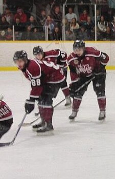 Maroons line up for a draw in 2013 playoffs. Maroons line up for faceoff.jpg