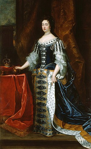 1690 painting of Mary. An orb is on the table to her right, as is the crown, which is placed on a cushion.