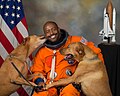 Image 49NASA astronaut Leland D. Melvin with his dogs Jake and Scout (from Dog behavior)