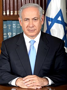 Photo of Netanyahu, in suit and tie, facing forwards