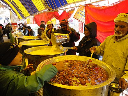 Pandal tents serving free community kitchen food to the pilgrims