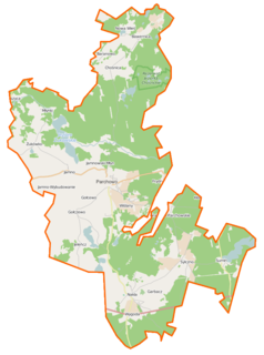 Mapa konturowa gminy Parchowo, blisko prawej krawiędzi nieco na dole znajduje się owalna plamka nieco zaostrzona i wystająca na lewo w swoim dolnym rogu z opisem „Sumino”