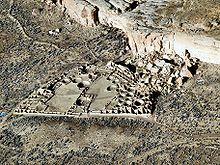 Pueblo Bonito, the largest of the Chacoan Great Houses, stands at the foot of Chaco Canyon's northern rim. Pueblo Bonito Aerial.JPG