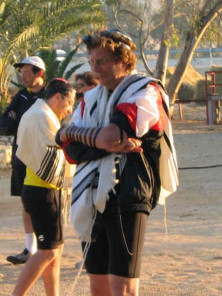 Rabbi Gordon Tucker participates in an early morning minyan, 2003.jpg