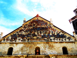 The pediment of San Joaquin Church featuring the Battle of Tetouan San Joaquin Church.png