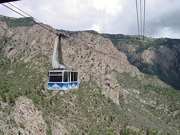 Cable cars pass mid-stream on the Sandia Peak Tramway in Albuquerque, New Mexico.