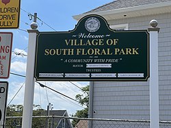 A welcome sign at an entrance to the village on August 11, 2022.