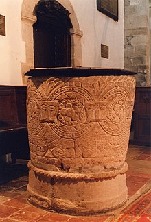Font of St Gregory's, Morville, considered possibly of Norman date, but with later additions. St Gregory, Morville - Font (geograph 2246508).jpg