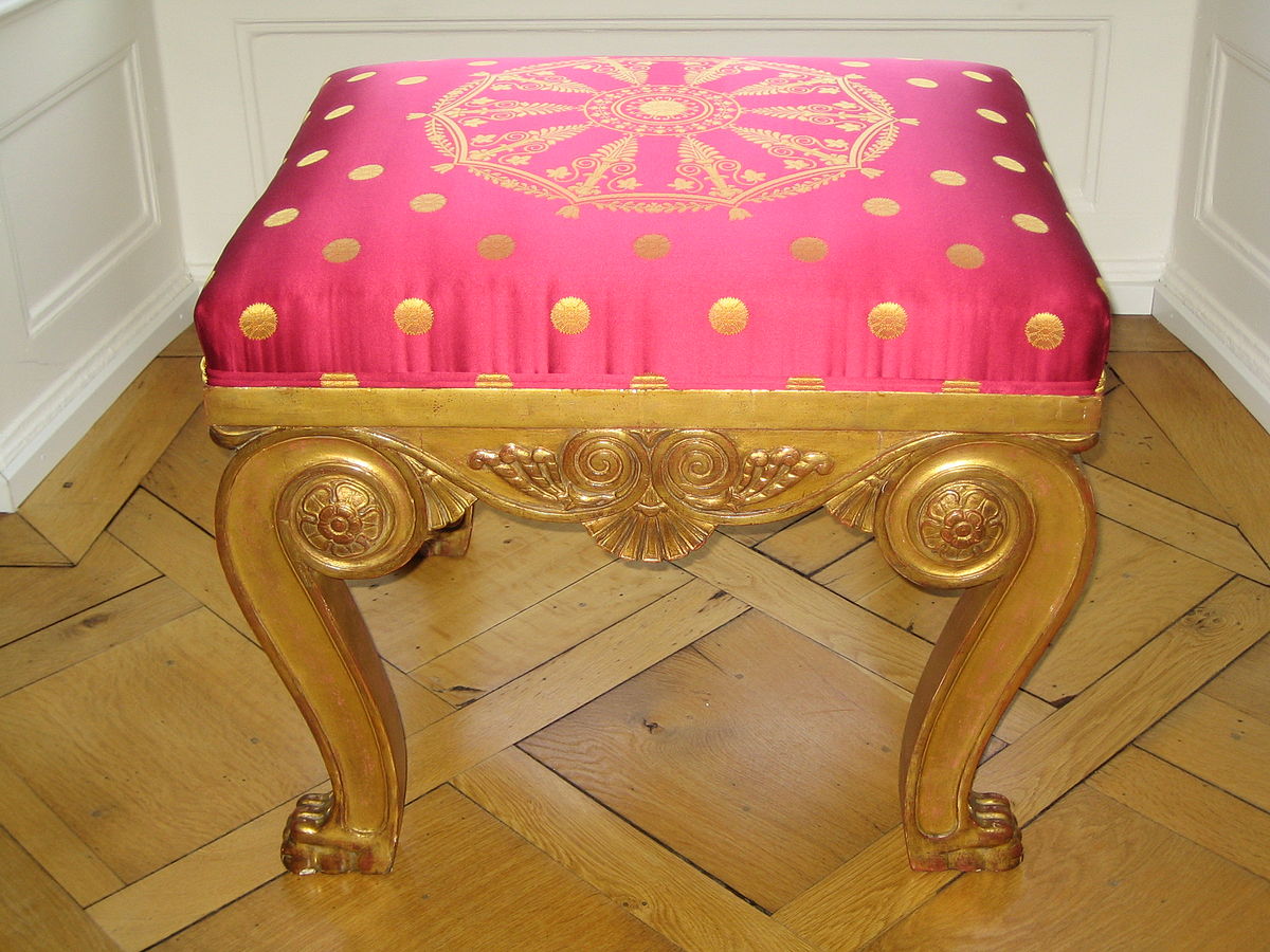 https://upload.wikimedia.org/wikipedia/commons/thumb/8/80/Stool_from_the_former_Palais_des_Tuileries_in_Paris_%28stamped_with_inventory_mark%29.jpg/1200px-Stool_from_the_former_Palais_des_Tuileries_in_Paris_%28stamped_with_inventory_mark%29.jpg