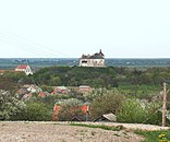 Zamek w Olesku I kościół św. Józefa klasztoru OO. Kapucynów.