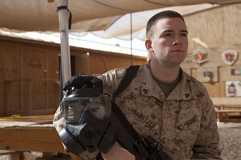 File:U.S. Marine Corps Cpl. Linton C. Sangster, a chemical, biological, radiological and nuclear defense specialist with 2nd Battalion, 6th Marine Regiment, poses with his gas mask at Forward Operating Base Geronimo 120108-M-NB713-003.jpg