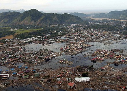 A town near the coast of Sumatra lies in ruin after the 2004 Indian Ocean earthquake and tsunami.