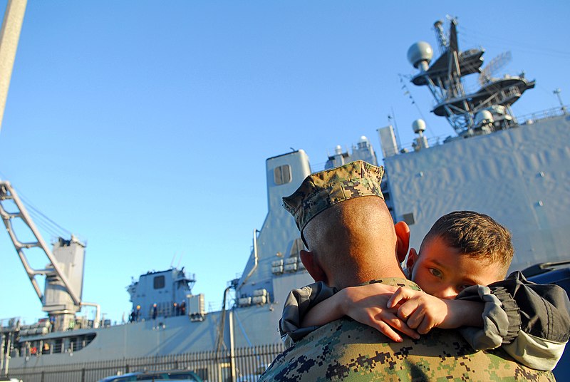 File:US Navy 070328-N-4776G-120 Gunnery Sgt. Octavio Gonzalez's son refuses to let go of his father's neck as he prepares to deploy with dock landing ship USS Pearl Harbor (LSD 52).jpg